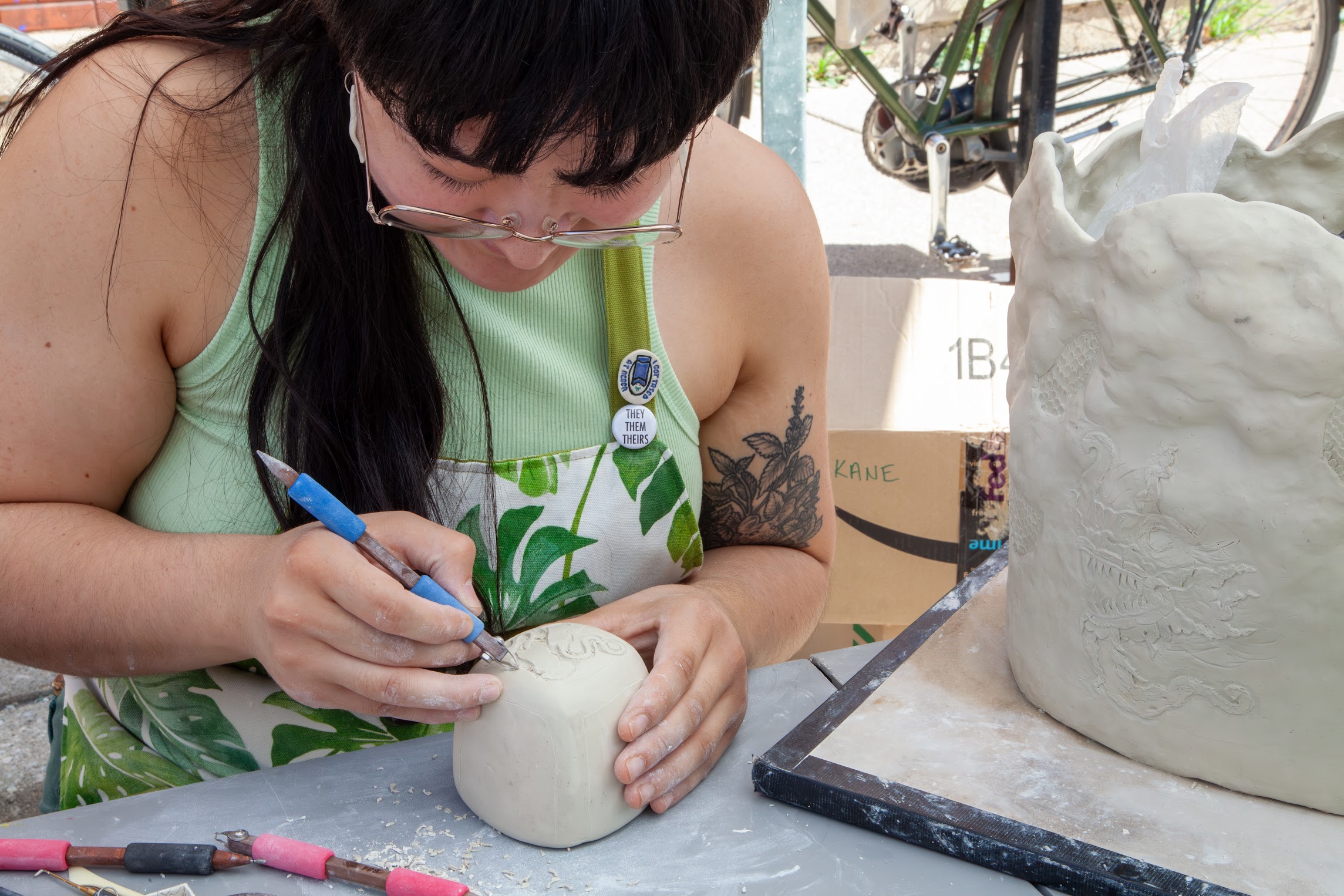 Artist working inside ceramics studio